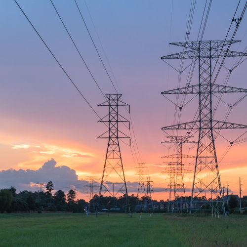Power lines amid beautiful sunset